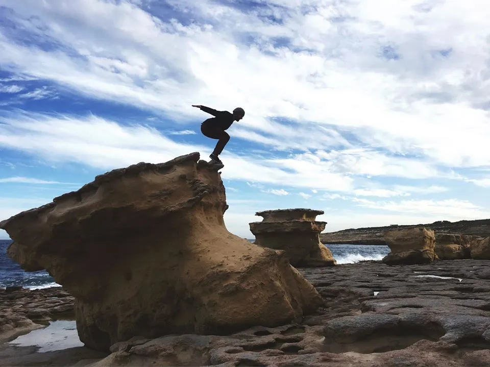 yoga on a cliffs edge